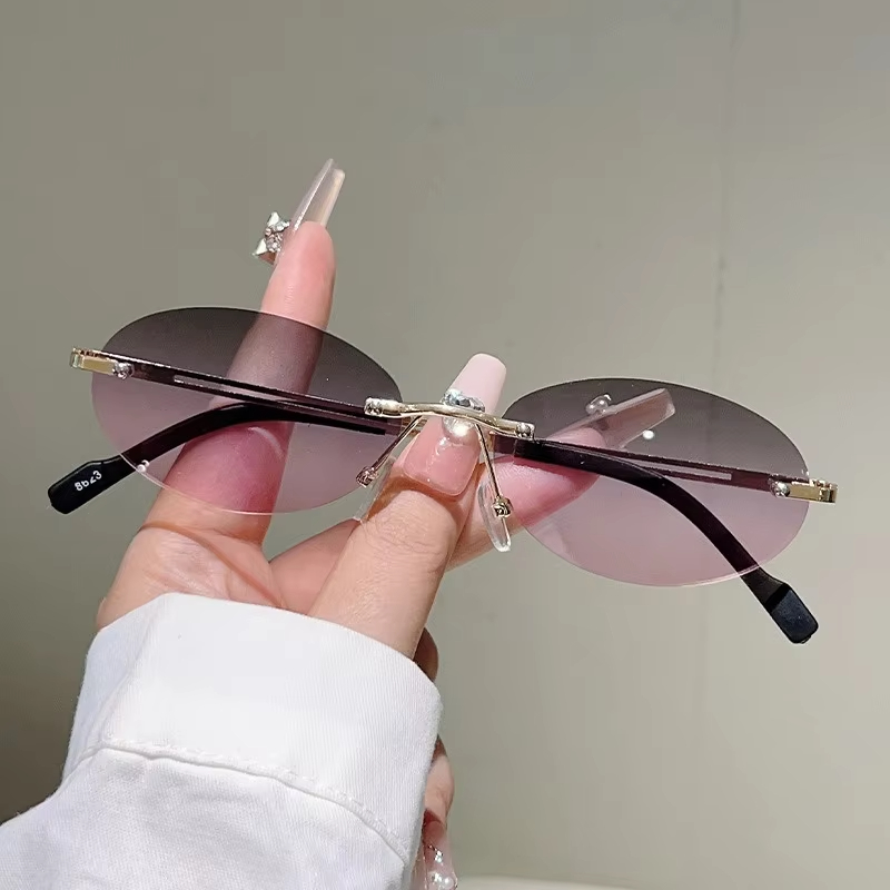 Rimless Oval Sunglasses Pink G - Vintage Fashion Definition recensie en prijs